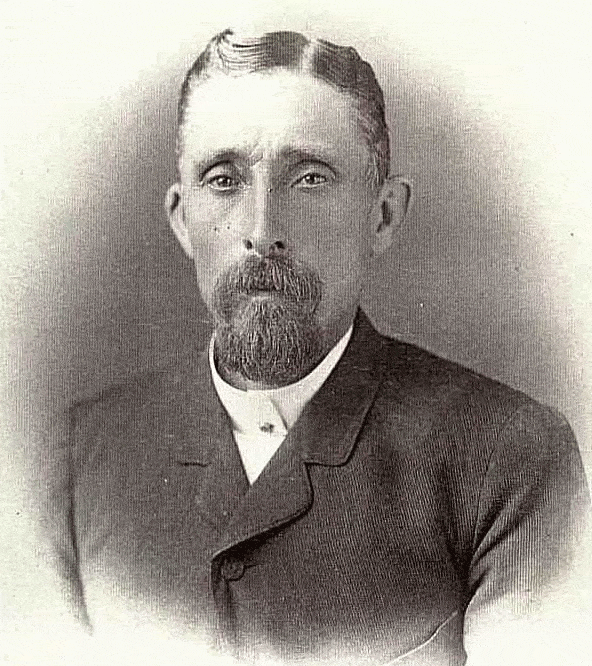 Headshot of William Wood who was born in 1837. The photo was taken when William was 45 years old. William parts his hair right of center, has a goatee, inquisitive eyes and an angular nose.