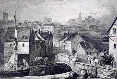 Bridge crossing leading to Maldon Hill with the town center and church at the top